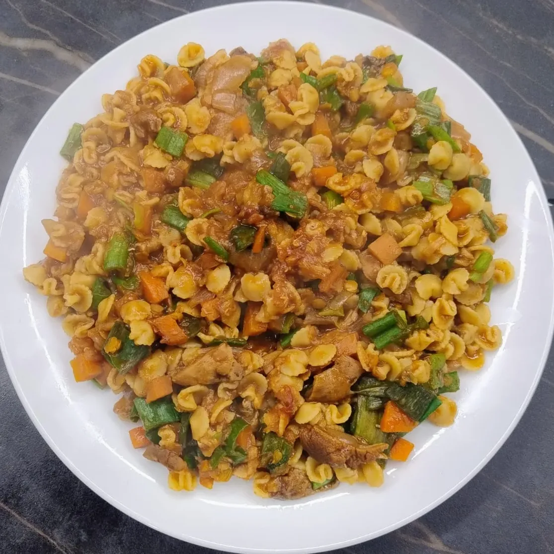 PASTINA AL RAGU’ DI LENTICCHIE, FUNGHI E CIPOLLOTTO